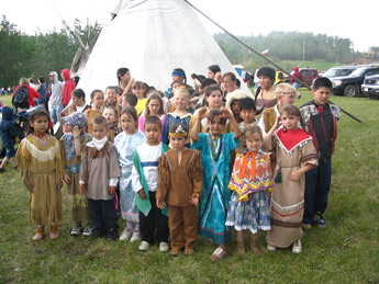 Doig River youth in dance regalia